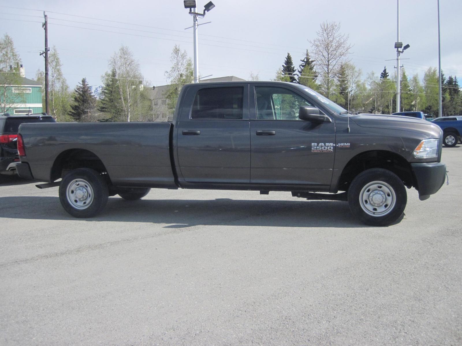 2016 gray /gray RAM 2500 Tradesman Crew Cab 4WD (3C6TR5HT6GG) with an 5.7L V8 OHV 16V engine, automatic transmission, located at 9530 Old Seward Highway, Anchorage, AK, 99515, (907) 349-3343, 61.134140, -149.865570 - Low miles on this ram 2500 come take test drive - Photo #3